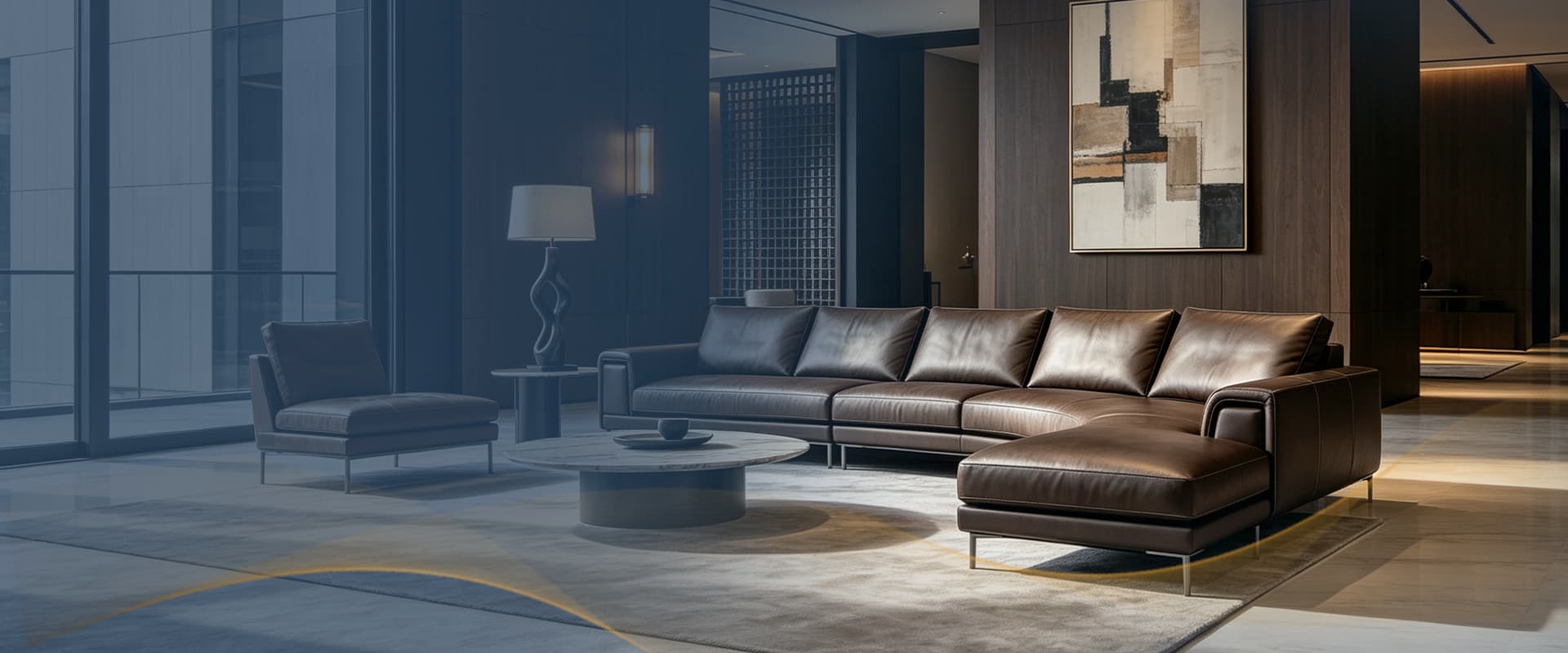 Dark, tailored living room with a genuine leather sectional sofa