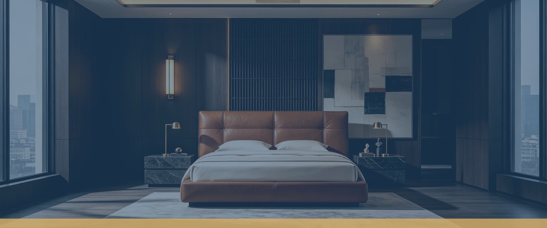 Tufted leather upholstered bed in a hospitality-style bedroom